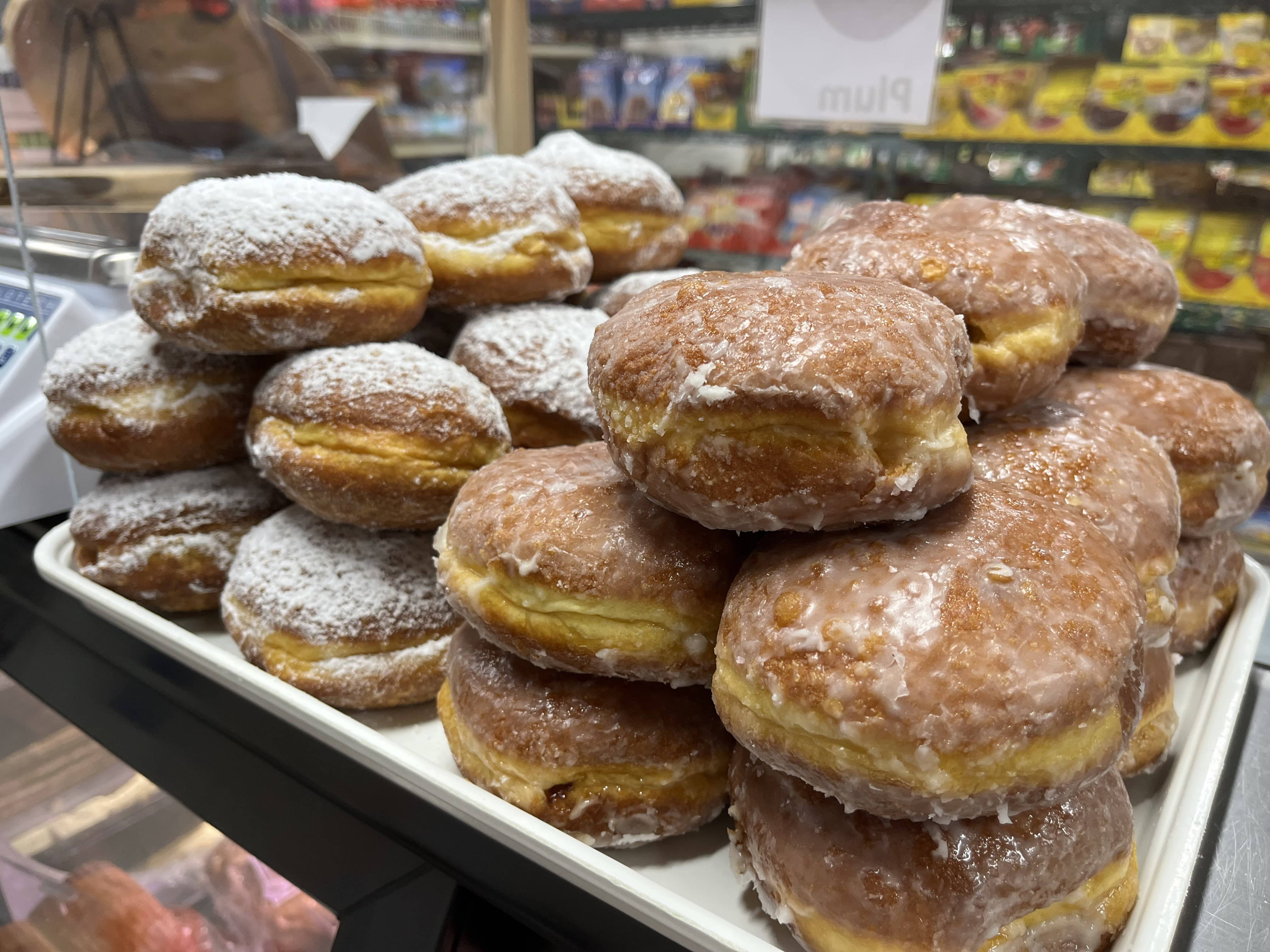 Polish donuts (paczki) arranged on a tray