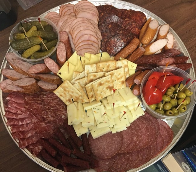 Tray featuring an assortment of meat