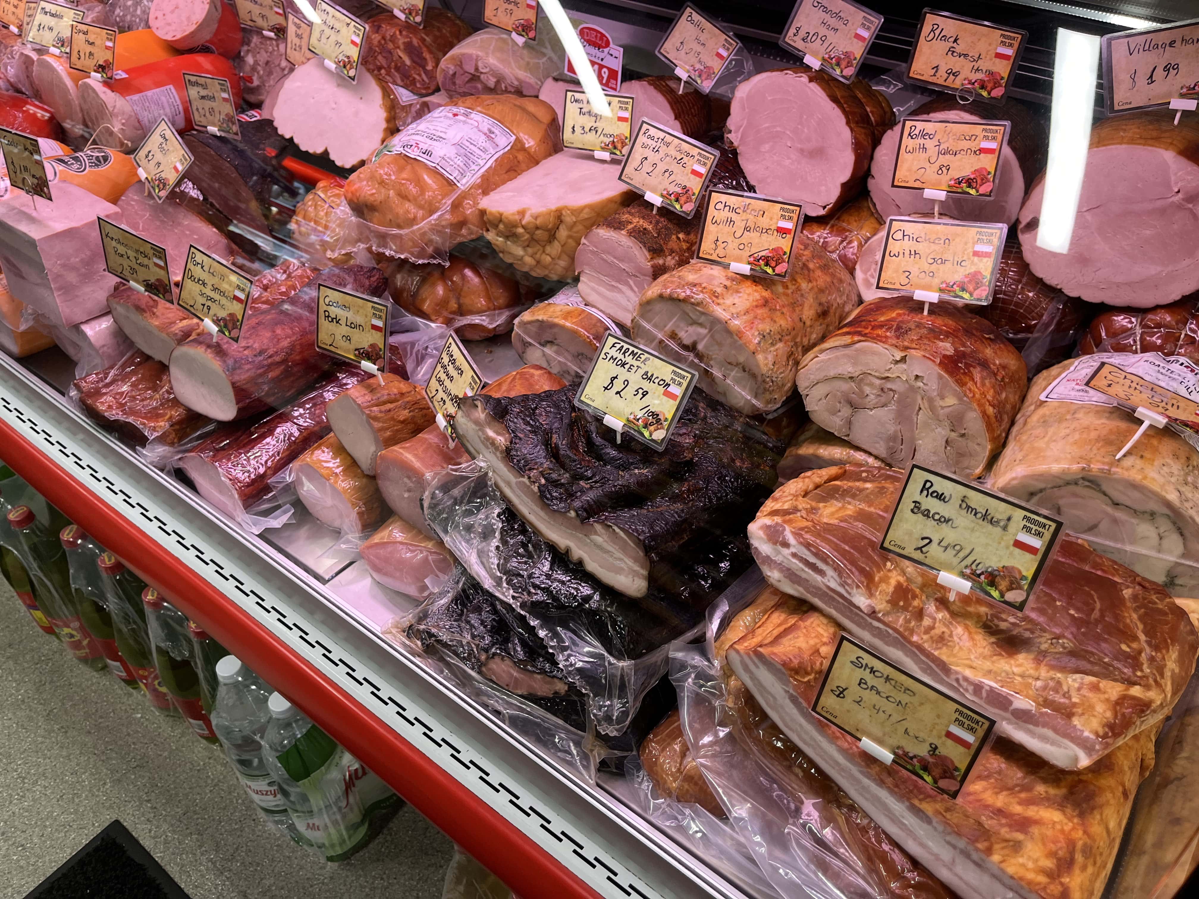 Selection of deli cold cuts on display